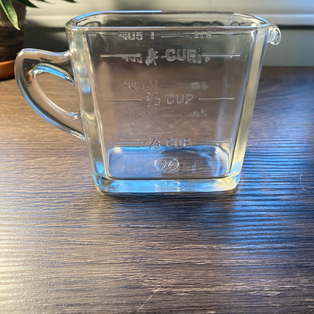 Kelloggs 1920 promo measuring cup . Stamped symbol K on bottom.